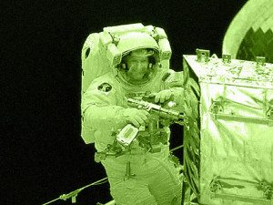 Astronaut Using Tools